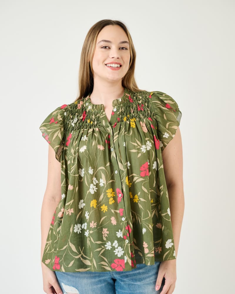 Front of a model wearing a size 3X Marissa Smocked Floral Top in N686 Green by Daniel Rainn. | dia_product_style_image_id:271890